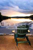 Wooden chair at sunset on beach