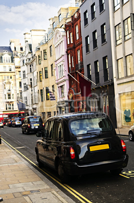 London taxi on shopping street