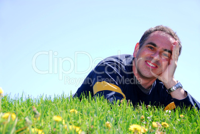 Smiling man on grass