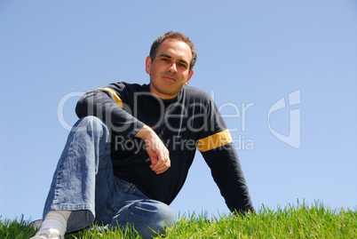 Man sitting on grass