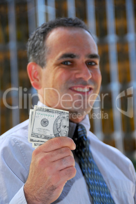 Businessman hold money