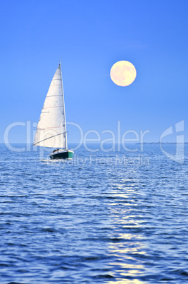 Sailboat at full moon