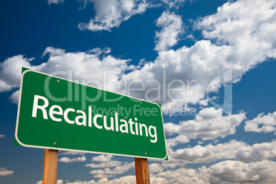 Recalculating Green Road Sign with Sky