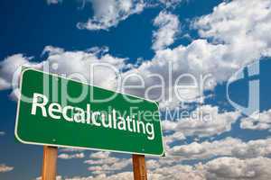 Recalculating Green Road Sign with Sky