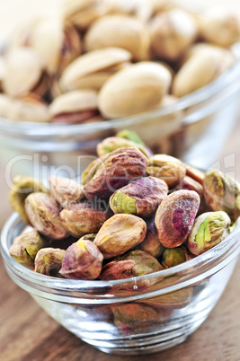 Pistachio nuts in glass bowls