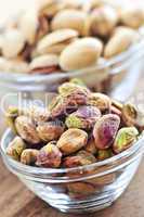 Pistachio nuts in glass bowls