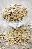Bowl of raw rolled oats