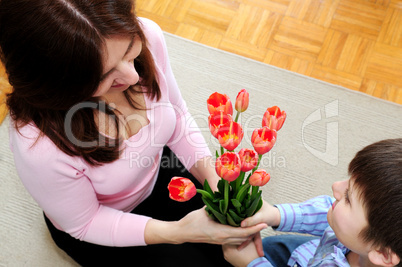 Mother and son with flowers