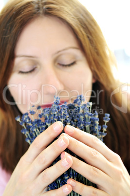 Woman smelling lavender