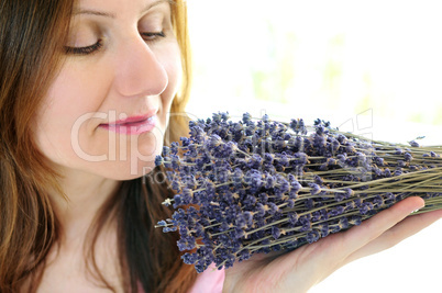 Woman smelling lavender