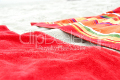 Beach towels on sand