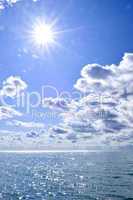 Blue water and sunny sky background