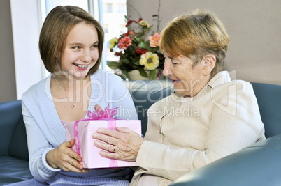 Granddaughter visiting grandmother