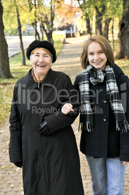 Granddaughter walking with grandmother