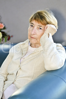 Sad elderly woman
