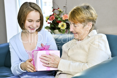 Granddaughter visiting grandmother