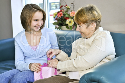 Granddaughter visiting grandmother