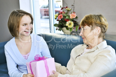 Granddaughter visiting grandmother