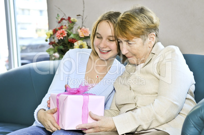Granddaughter visiting grandmother