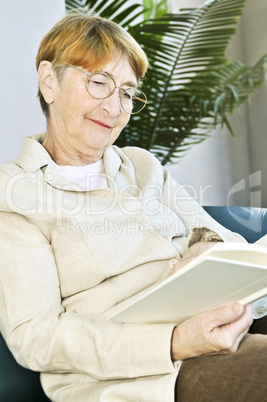 Old woman reading book