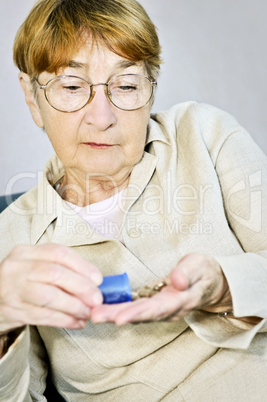 Elderly woman with medication