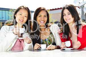 Group of girlfriends having coffee