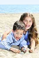 Brother and sister at beach