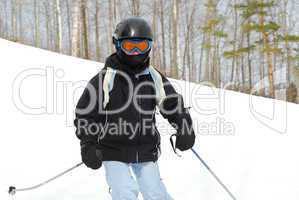 Girl skiing downhill