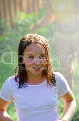 Girl and sprinkler