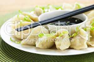 Steamed dumplings and soy sauce