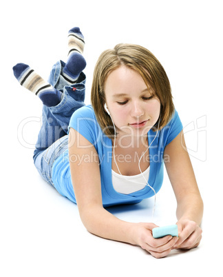 Teenage girl listening to music