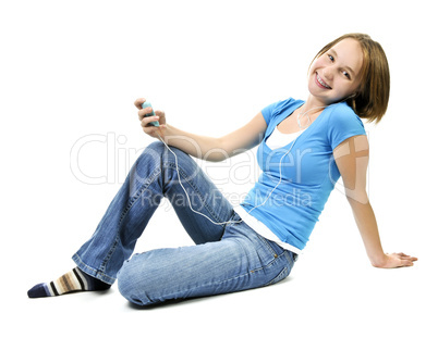 Teenage girl listening to music