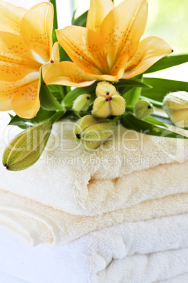 Stack of towels with flowers