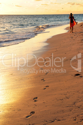 Woman walking on beach