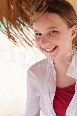 Young girl on tropical beach