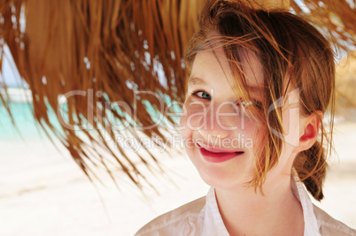 Young girl on tropical beach