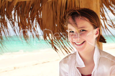 Young girl on tropical beach