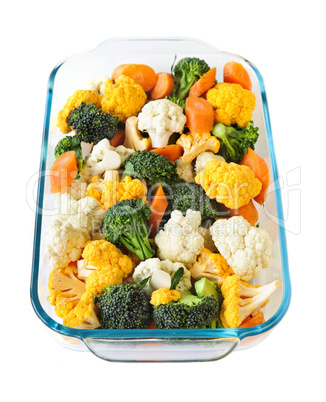 Raw vegetables in baking dish