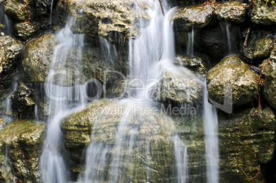 Waterfall over stones