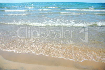 Beach wave sand