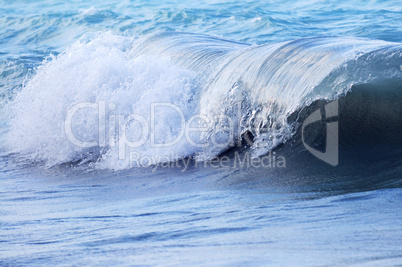 Wave in stormy ocean