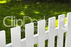 Front yard with white fence