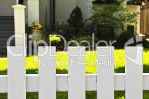 Front yard with white fence