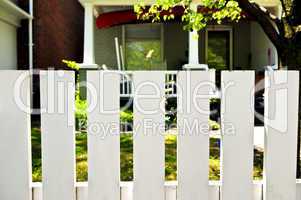 Front yard with white fence