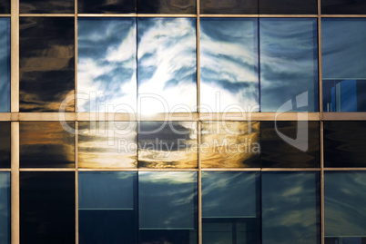 Sky reflecting in office windows