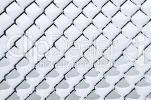 Link fence under snow
