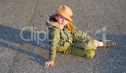 Girl sit outside