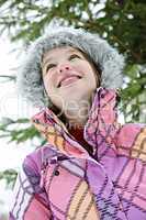 Happy young girl in winter jacket