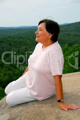 Woman edge cliff