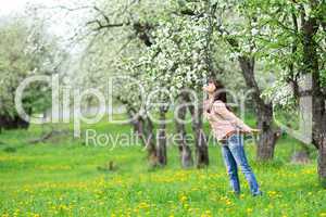 Woman smelling flowers